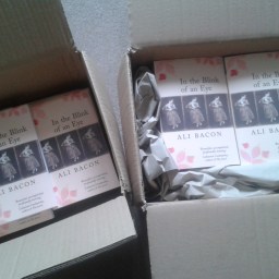 Opening the book box.  A tale of two covers.